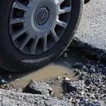 Potholes Damage to Cars