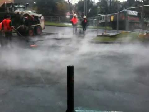 can you seal coat asphalt in the rain